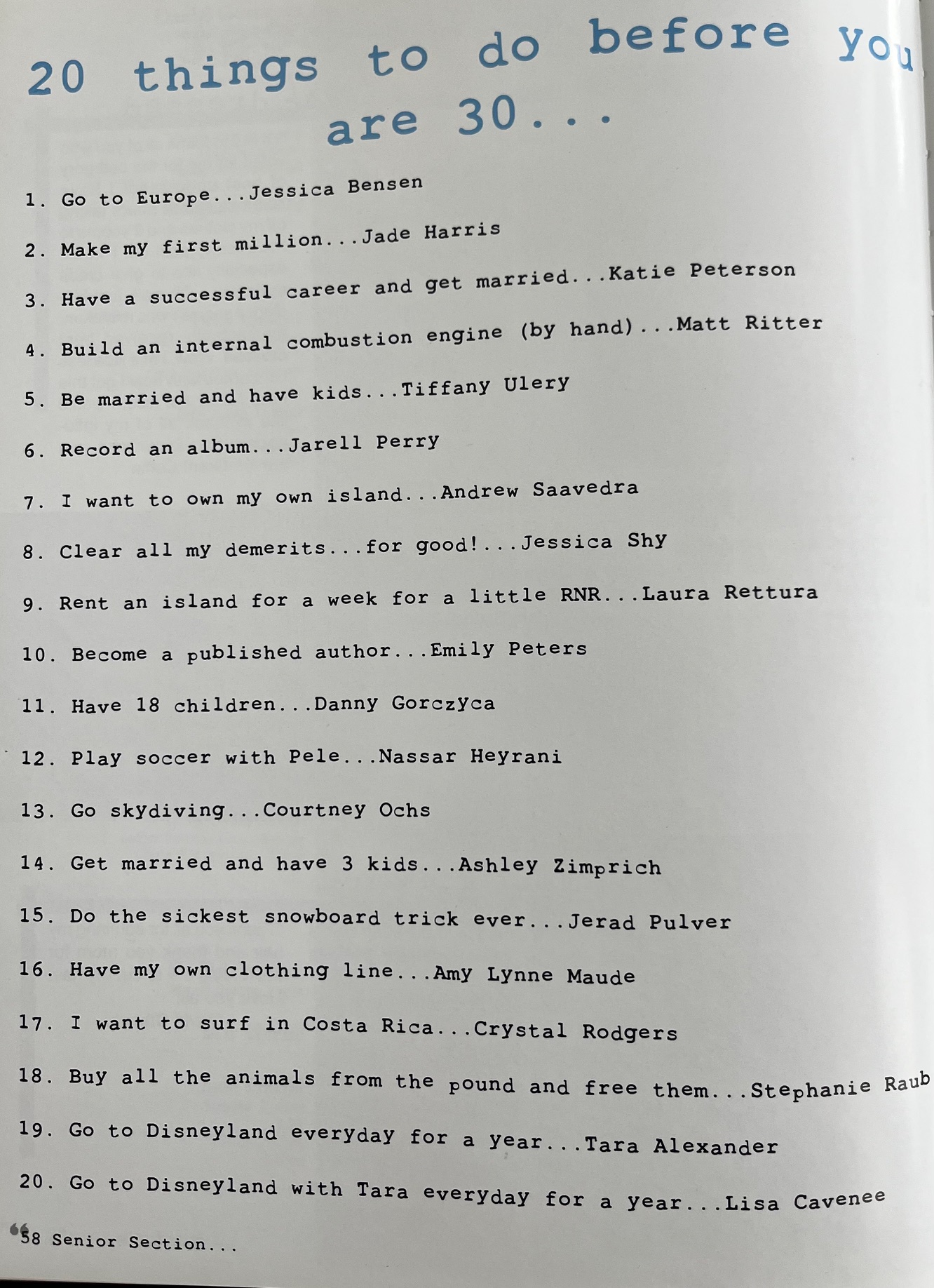 A display case full of trophies and colorful paintings in a school hallway.